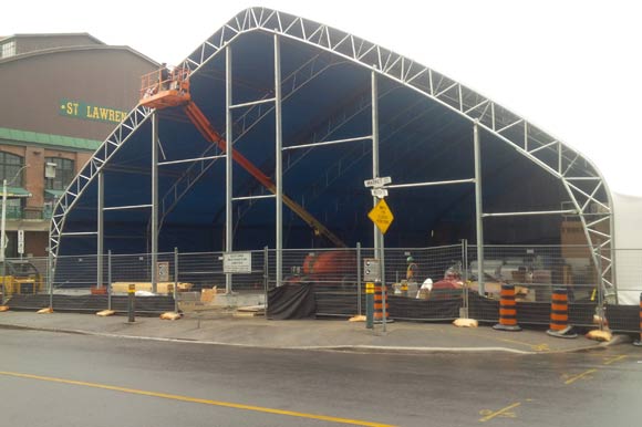 Workers are expected to finish the temporary North St. Lawrence Market building this spring.